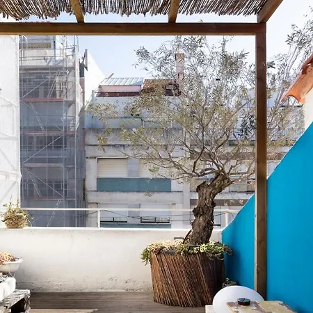 Plum Guide - By The Books Apartment Lisbon